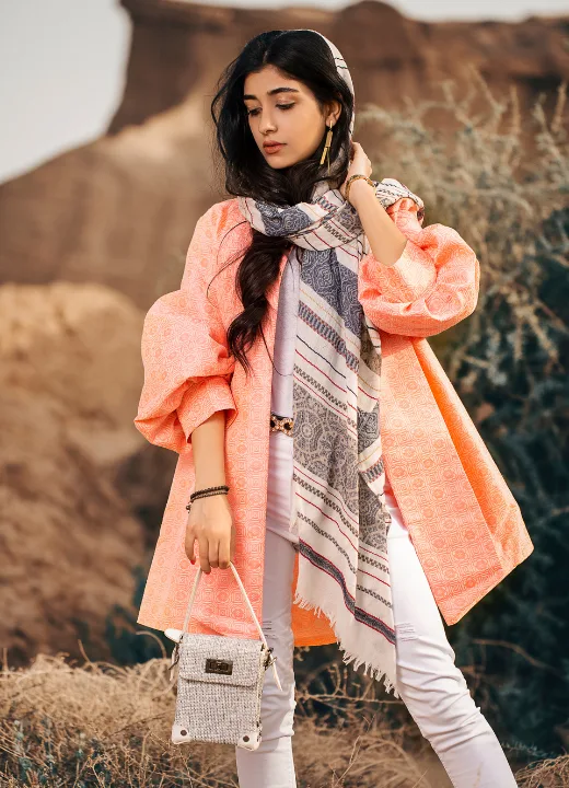 Graceful Modest Fashion with Peach Tones and Chic Accessories