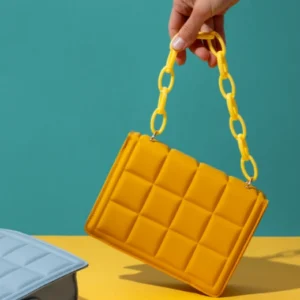 Vibrant Yellow Quilted Handbag with Trendy Chain Handle Design